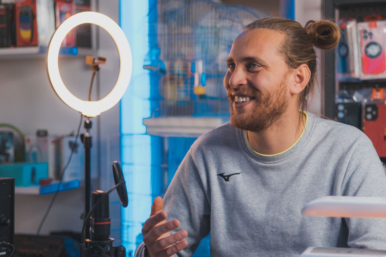 Smiling developer at a computer